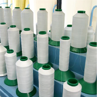 Multiple thread spools for a quilting machine are ready for action.
