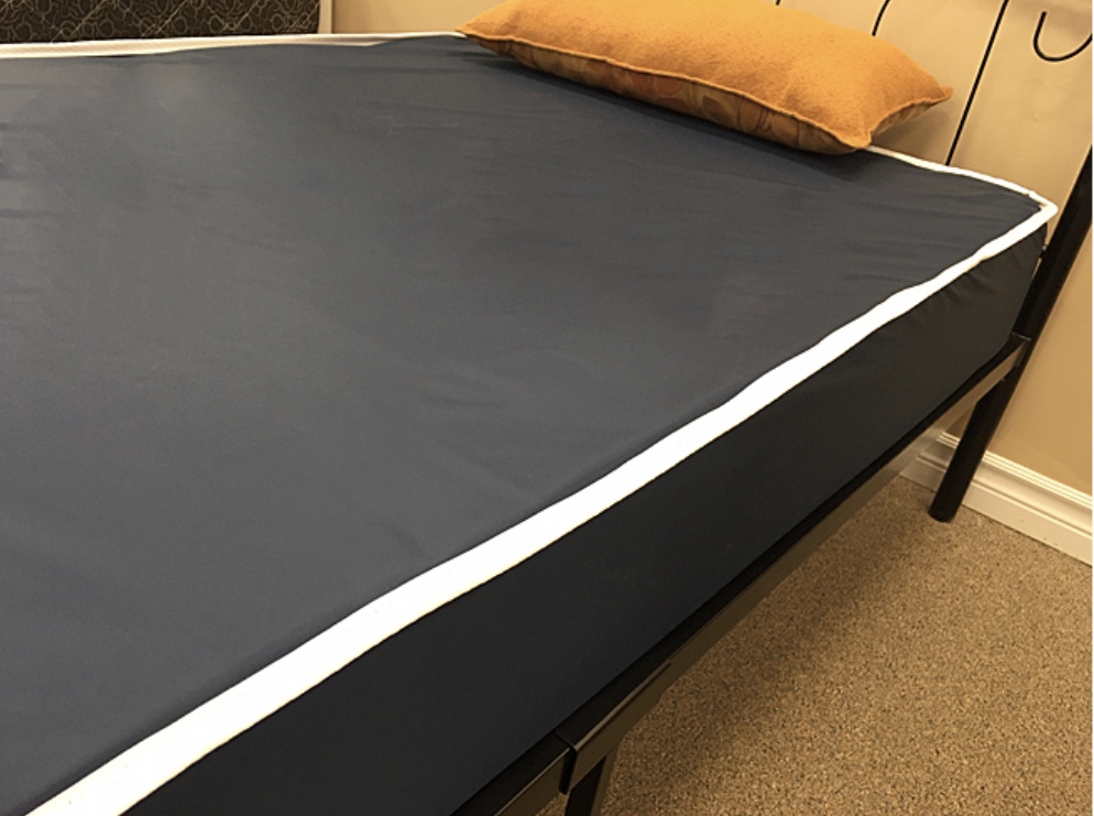 Vinyl covered Group Home mattress that can be shipped in a box in Canada